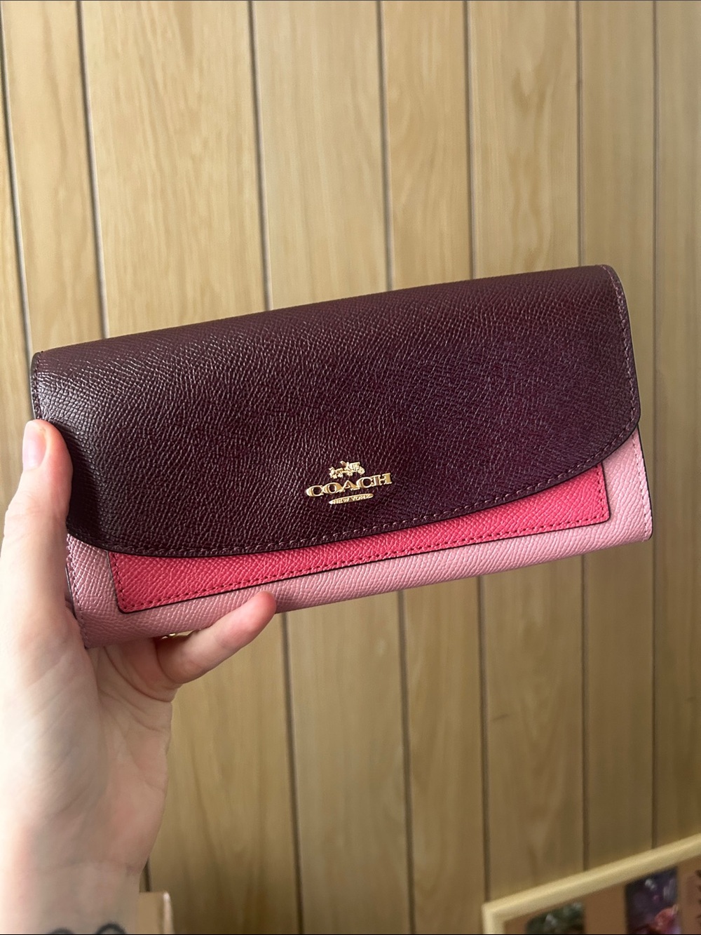 Coach burgundy and pink slim envelope wallet